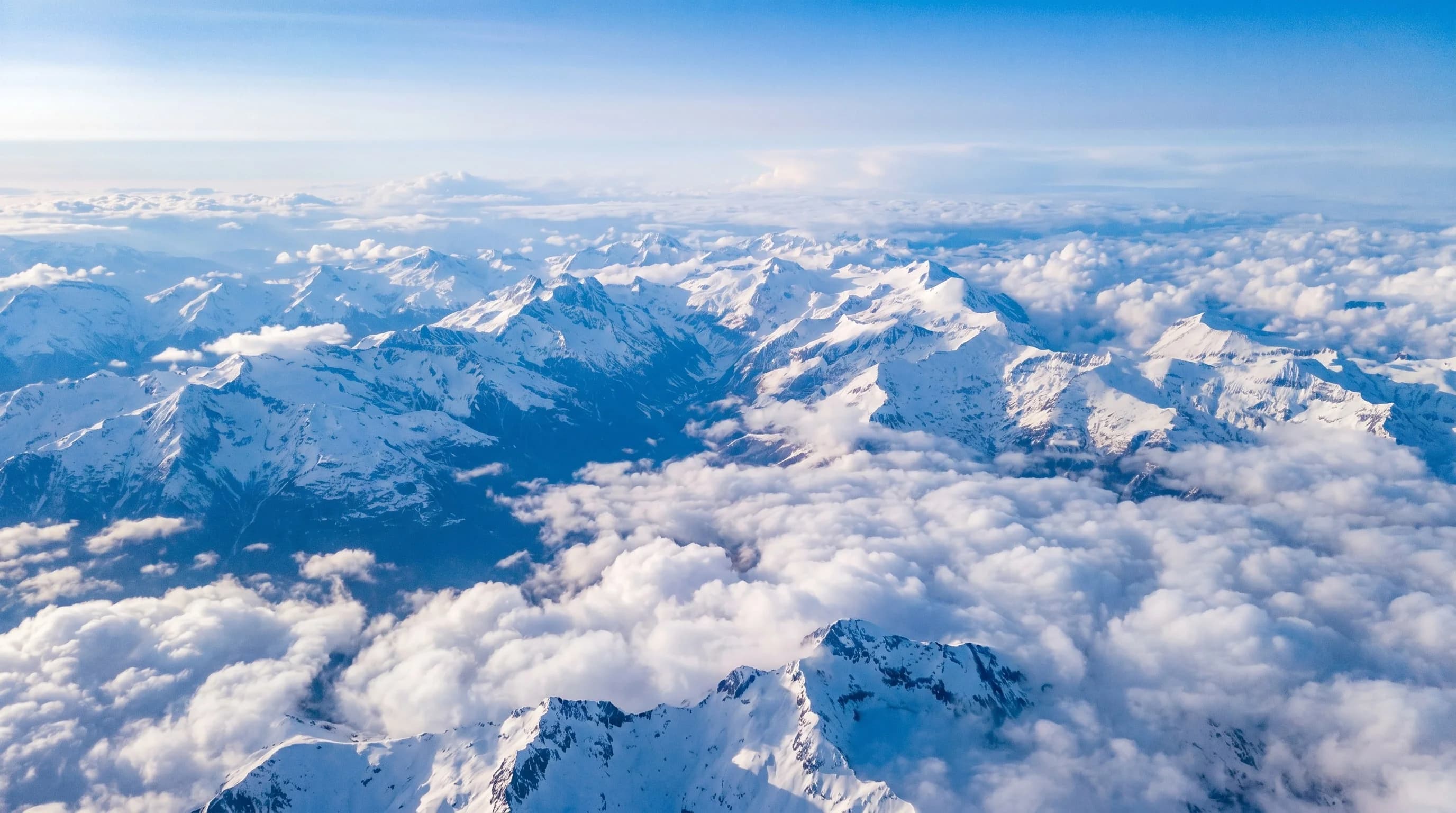 Himalayan summits rising through cloud